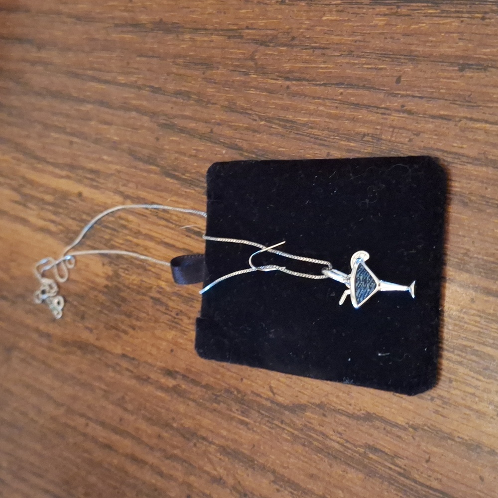 Silver chain with a drink charm